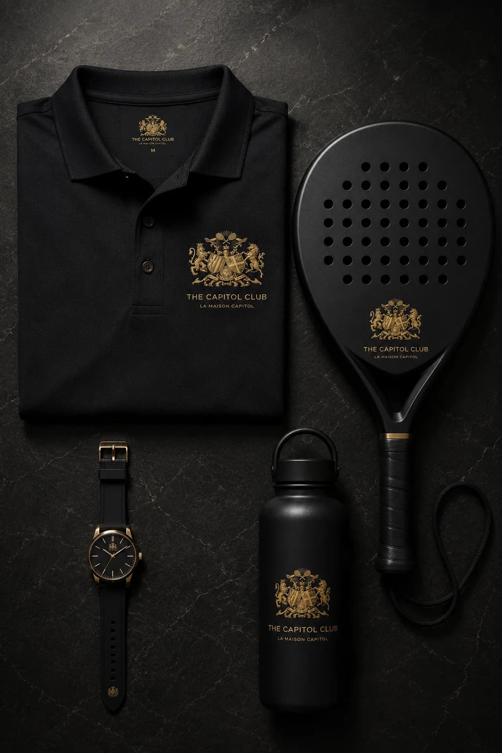 Member kit — dark polo, watch, racket and monogrammed bottle on slate